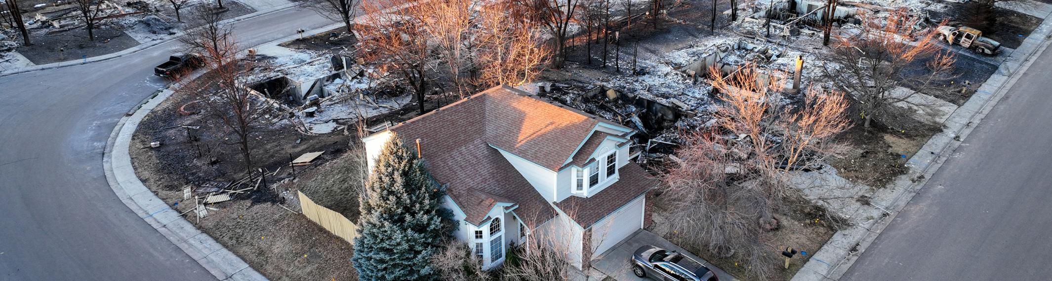 A single home remains on a street following the 2021 Marshall Fire in Broomfield.