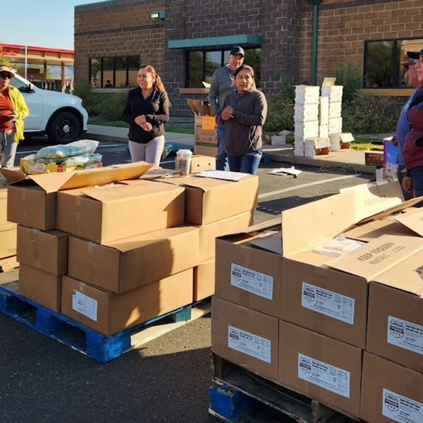 Members of the Safe and Abundant Nutrition Alliance (SANA) at a food distribution event 