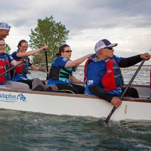 From left, Team Blue coach Chris Wiegand and adaptive athletes Lauren Slack, Alison Rehfus, Heather Tram, Rich Ochiuzzo, and Amy Lee work on techniques during practice at Standley Lake in Westminster.